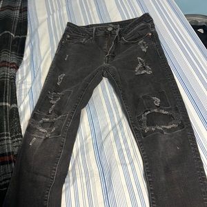 Black ripped American eagle jeans